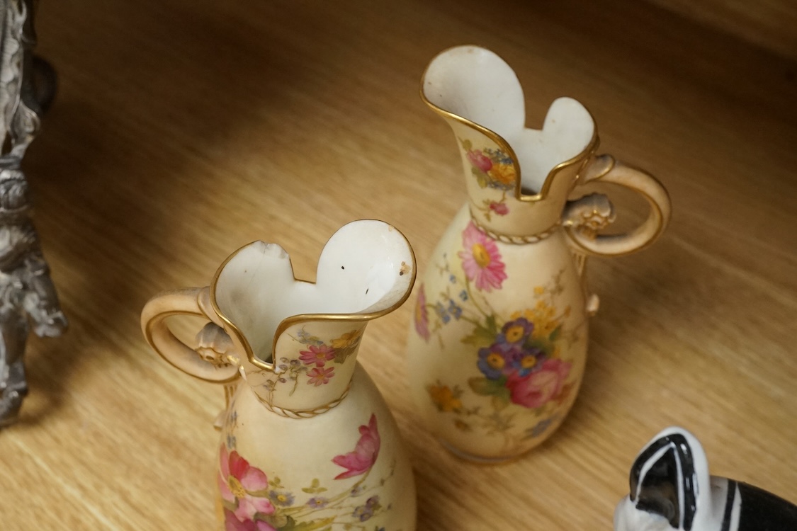 A pair of Worcester blush miniature ewers, an Italian pottery cat and a glass decanter and stopper, decanter 27cm high